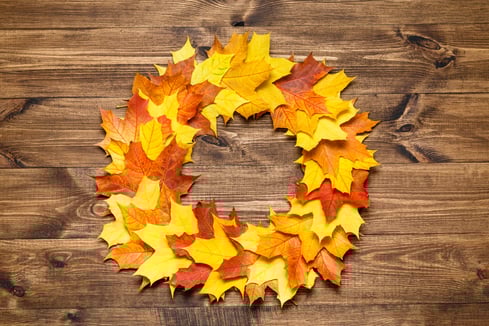 round-frame-made-of-autumn-dried-leaves-on-wooden-2025-01-09-04-19-56-utc (1)